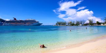 Beach with a cruise ship in the background